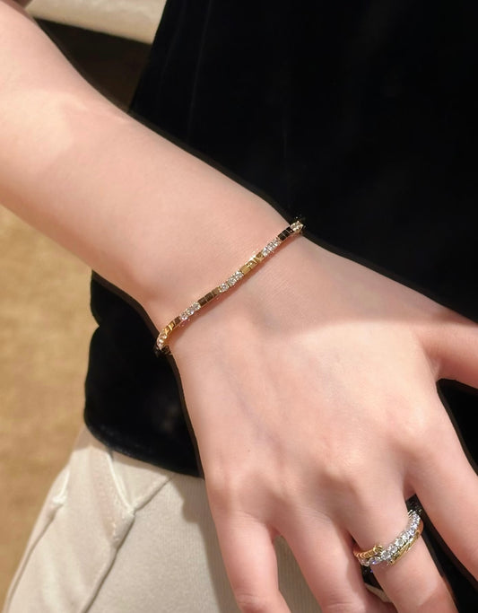 Lunelle Atelier modern bar tennis bracelet with sleek metal bars and minimalist design, displayed on a neutral background.