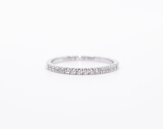 Silver ring with small stones on a white background