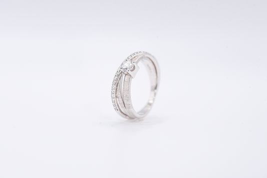 Silver ring with gemstones on a white background