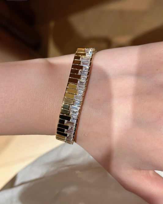 Lunelle Atelier Piano Key Baguette Bracelet featuring gold-tone rectangular piano key charms on a delicate bracelet.