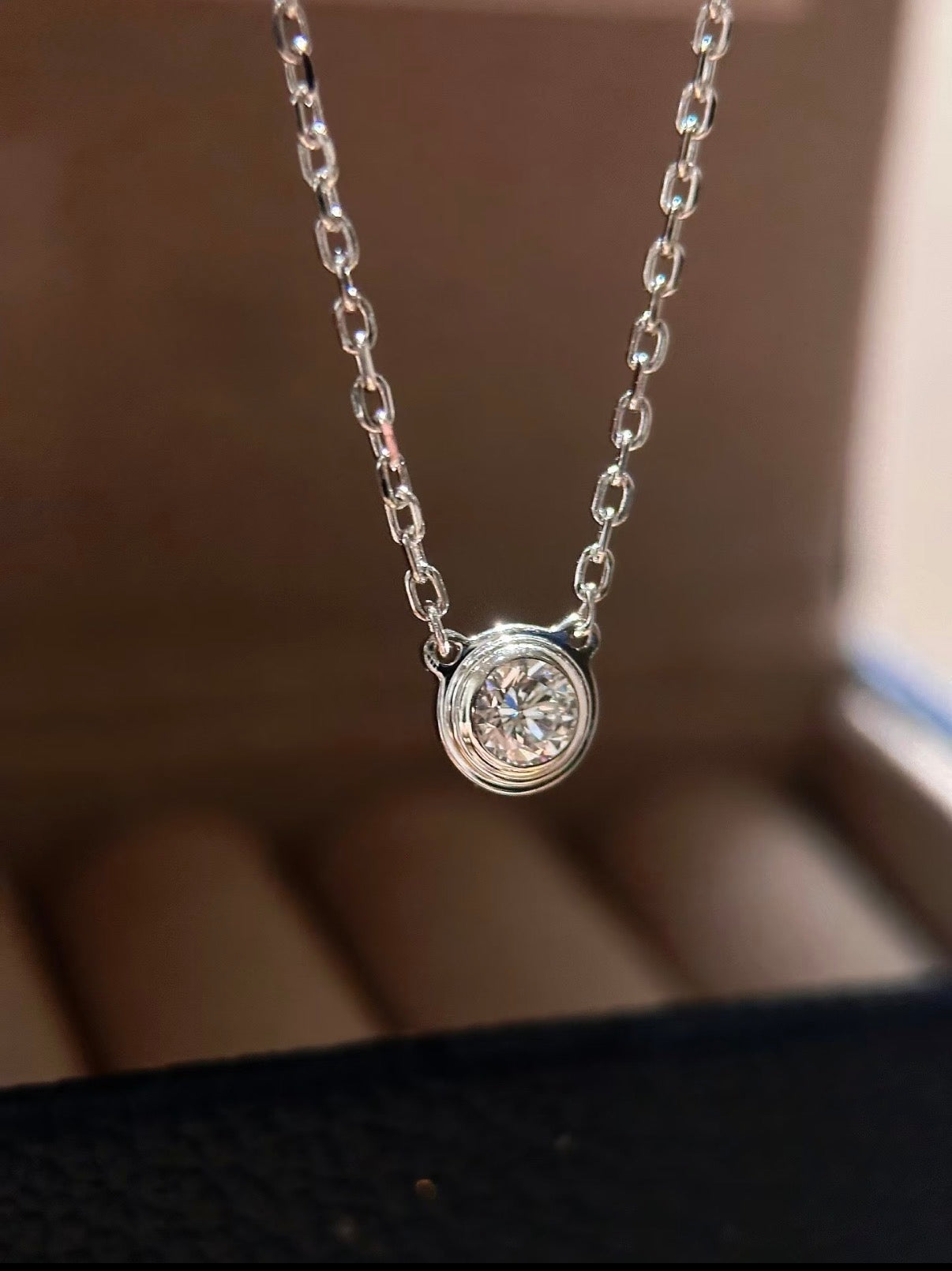 Lunelle Atelier bezel solitaire 0.23 ct lab-grown diamond necklace featuring a single sparkling diamond on a delicate chain.