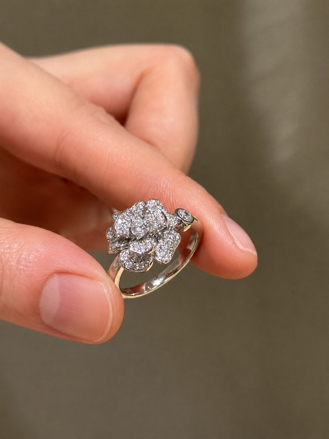 Lunelle Atelier Camellia Bloom Ring featuring a delicate floral design with gold finish and intricate petal details.