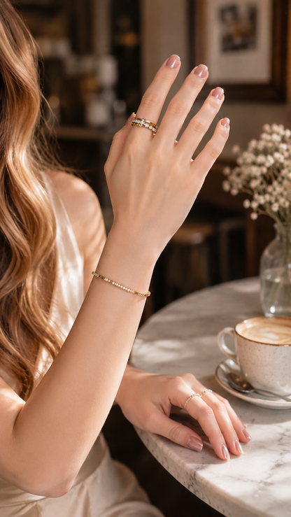Lunelle Atelier Pivot Multi-Band Convertible Ring showcasing overlapping gold bands and adjustable design.