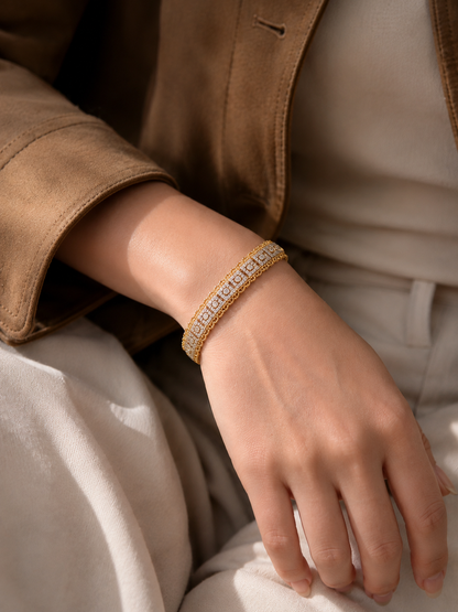 Lunelle Atelier Roman Lace Pavé Statement Bracelet showcasing intricate lace design and sparkling pavé gemstones on a silver-tone bracelet.