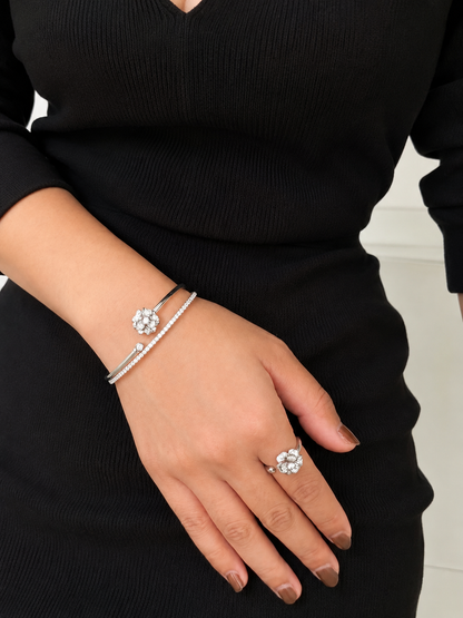 Lunelle Atelier Camellia Bloom Bangle bracelet with intricate floral design and gold-toned finish.