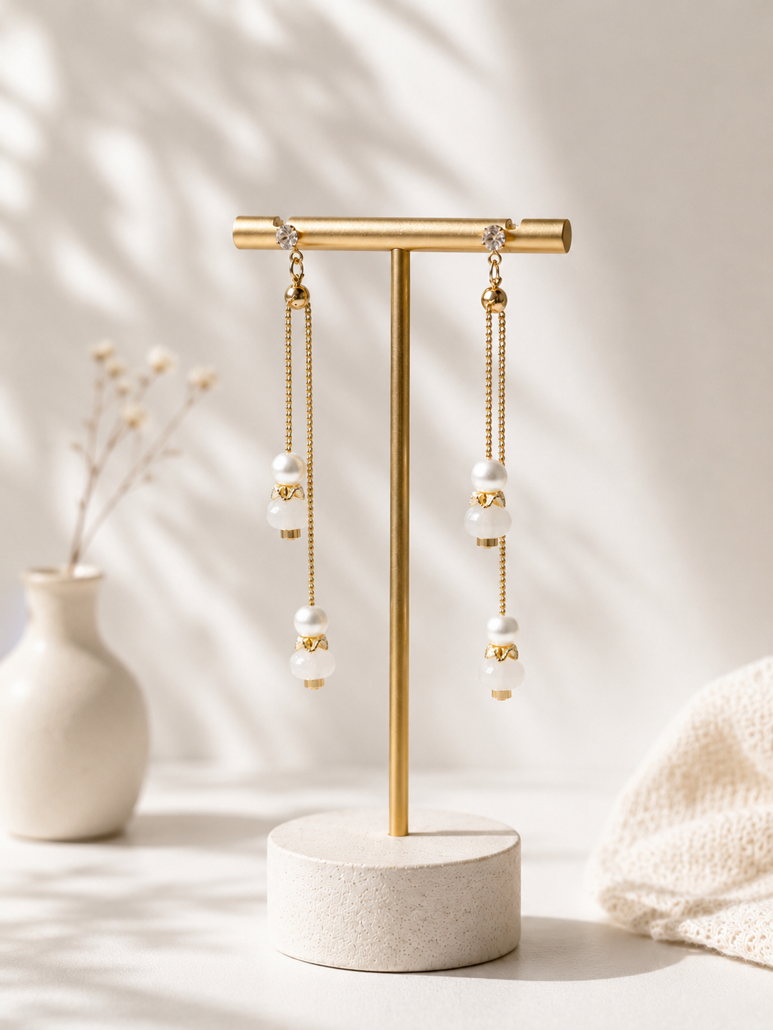 Lunelle by Heart and Hand Tianshan Jade adjustable drop earrings featuring green jade pendants and silver hooks.
