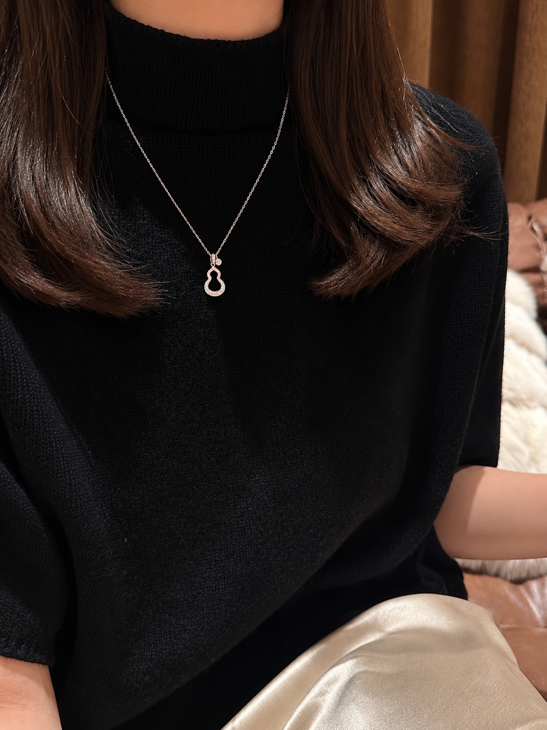 Lunelle Atelier Lucky Gourd Baguette Necklace featuring a pendant with a lucky gourd design on a delicate chain