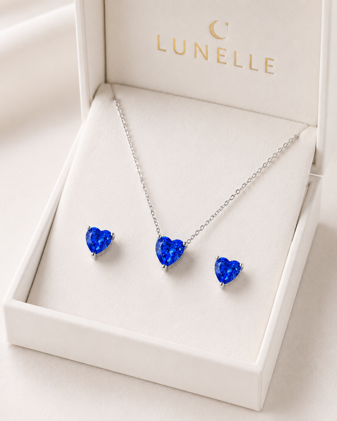 Lunelle Atelier Heart Glow gemstone necklace featuring a shimmering heart-shaped pendant on a delicate chain.