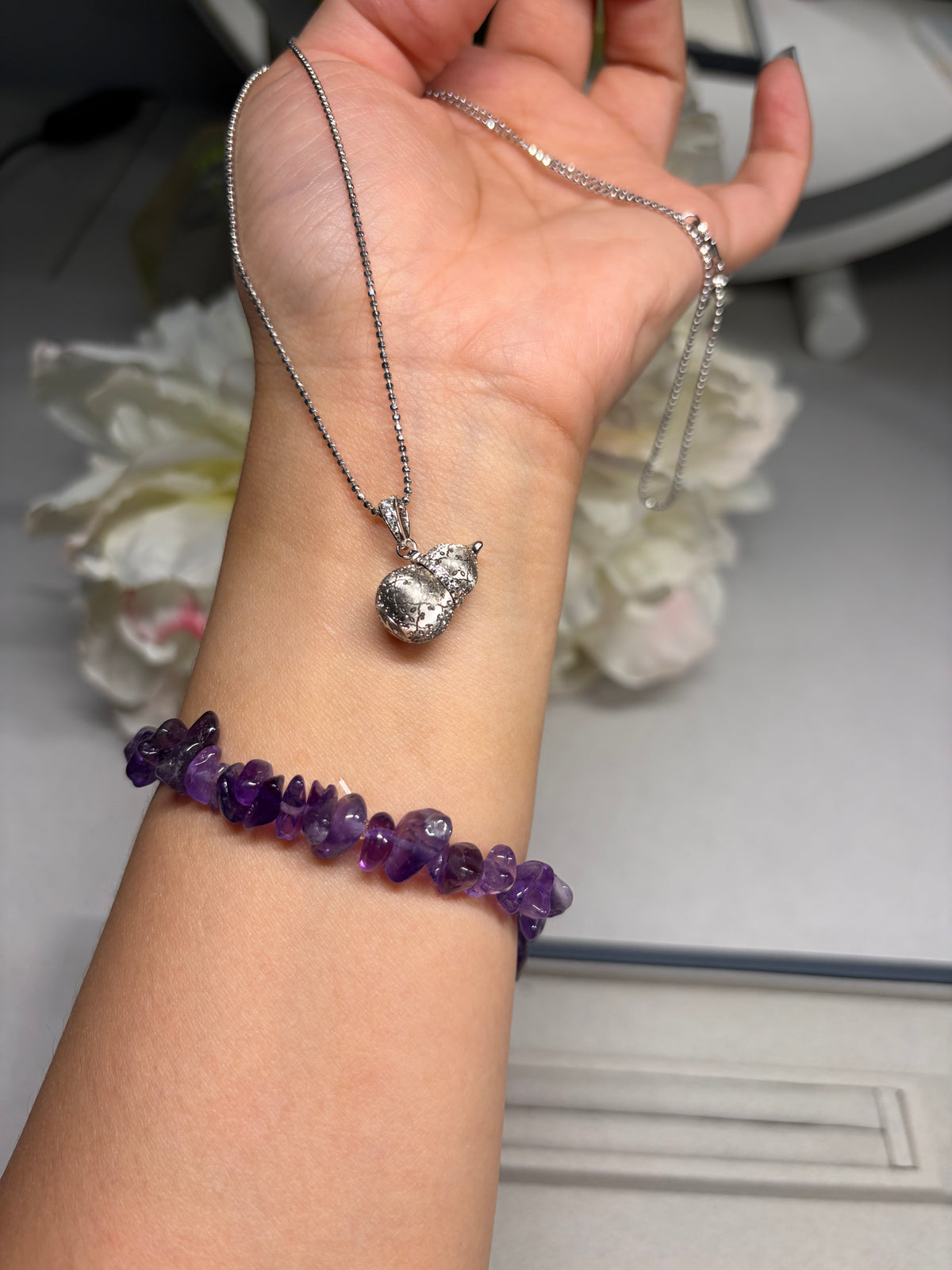 Lunelle Atelier petite auspicious gourd pendant necklace featuring a delicate gold chain and a small carved gourd charm.