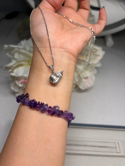 Lunelle Atelier petite auspicious gourd pendant necklace featuring a delicate gold chain and a small carved gourd charm.