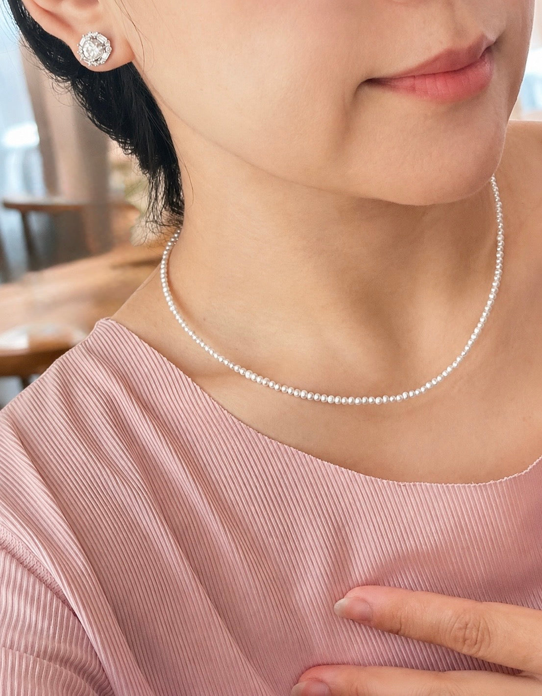 Lunelle by Heart and Hand Mini freshwater pearl necklace with small, lustrous pearl beads on a delicate chain.