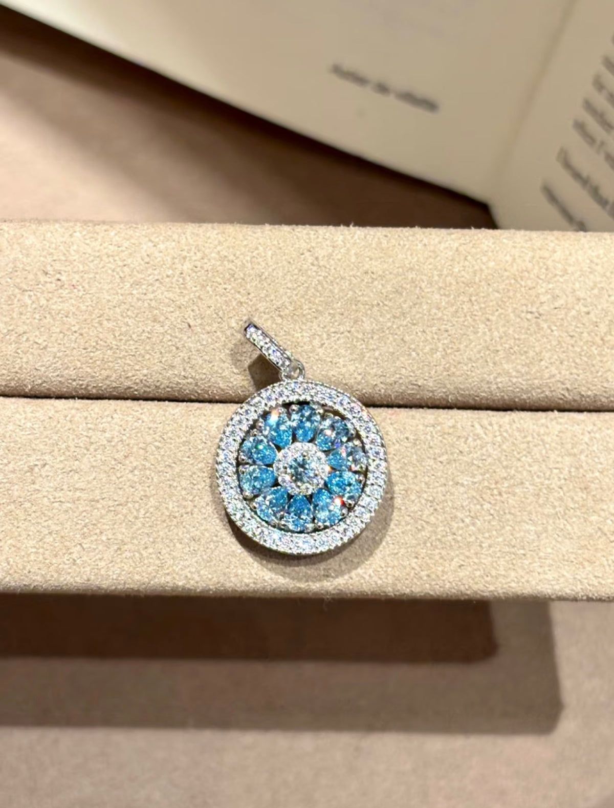 Lunelle Atelier spinning compass pendant necklace with enhancer clasp, featuring a detailed compass design on a delicate chain.