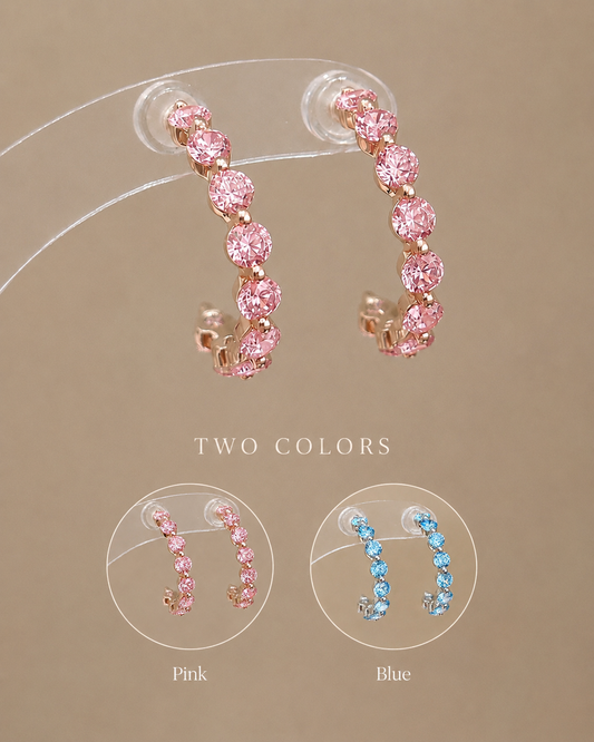 Lunelle Atelier floating round-cut tennis half hoop earrings in silver, showcasing elegant, minimalist jewelry design.