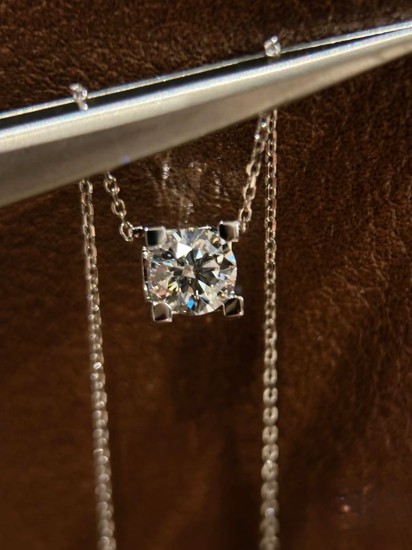 Lunelle Atelier sculpted solitaire lab-grown diamond necklace featuring a single sparkling diamond pendant on a delicate chain.