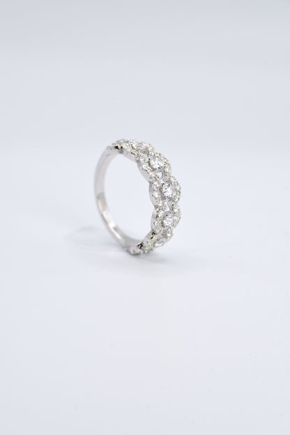 silver ring with multiple stones on a white background
