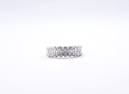 Silver ring with multiple gemstones on a white background