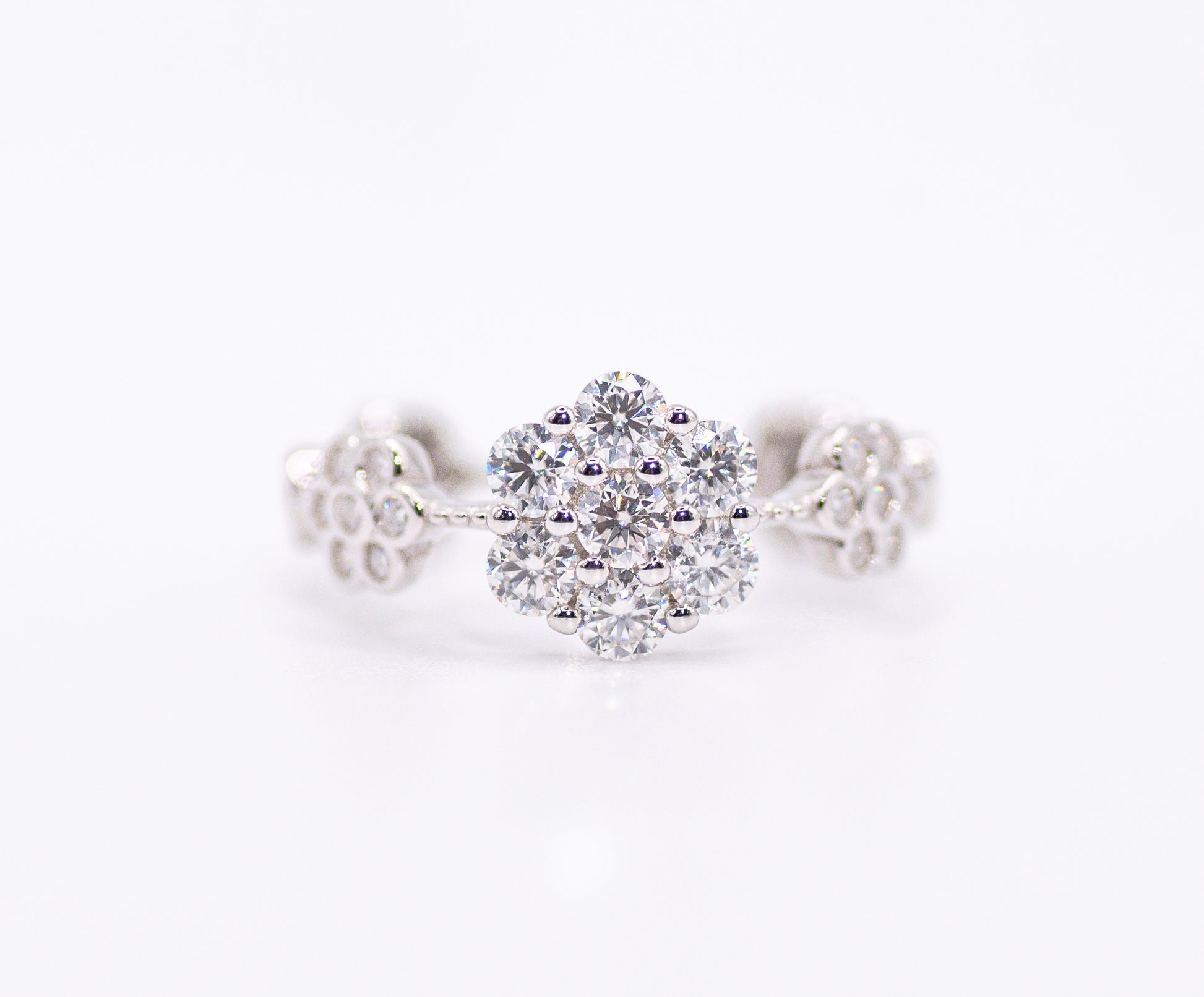 Silver necklace with a sparkling diamond pendant on a white background