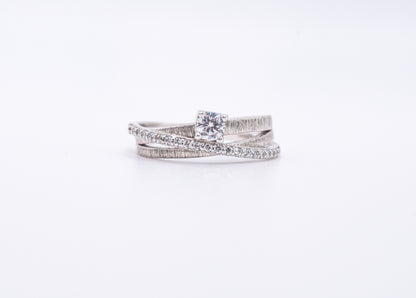 silver rings with gemstones on a white background