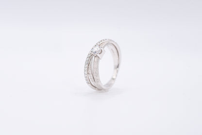 Silver ring with gemstones on a white background