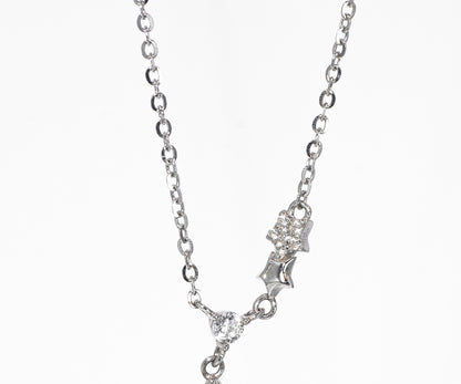 Silver necklace with a pendant on a white background