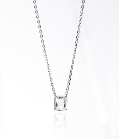 Silver necklace with a square-cut pendant on a white background