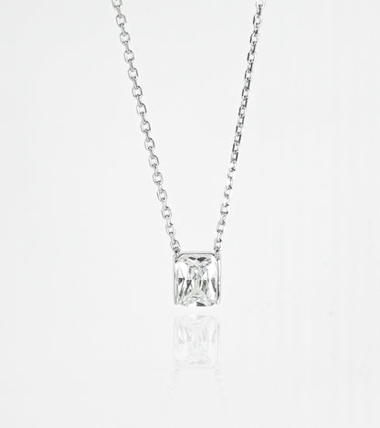 Silver necklace with a square-cut pendant on a white background