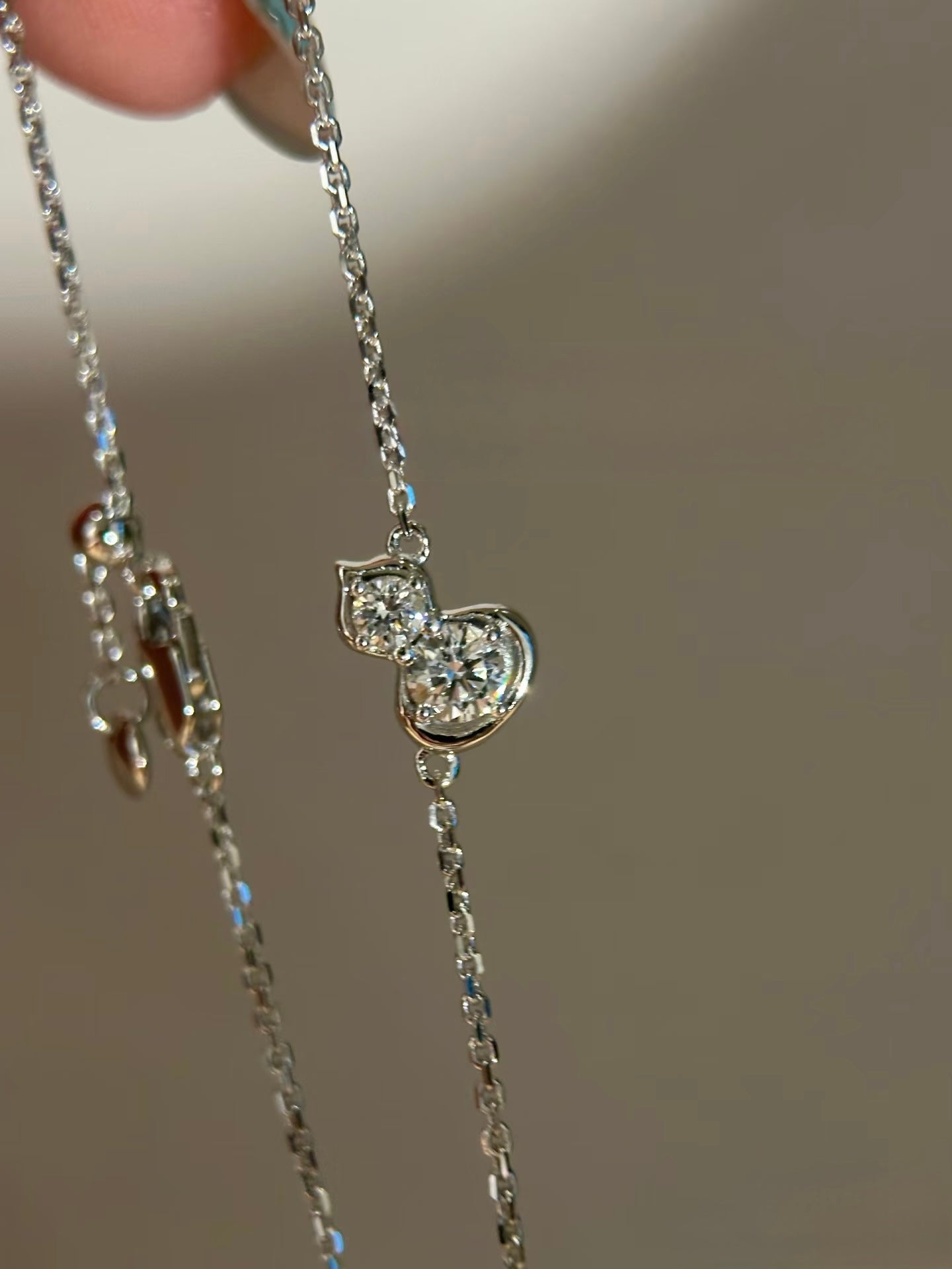 Lunelle Atelier Lucky Gourd lab-grown diamond adjustable bracelet with a decorative gourd charm and sparkling diamonds.