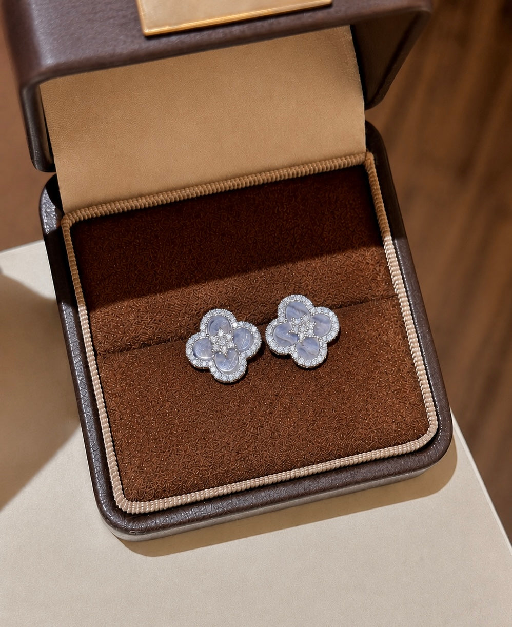 Lavender petal chalcedony stud earrings by Lunelle Atelier featuring delicate gemstone petals and silver settings.