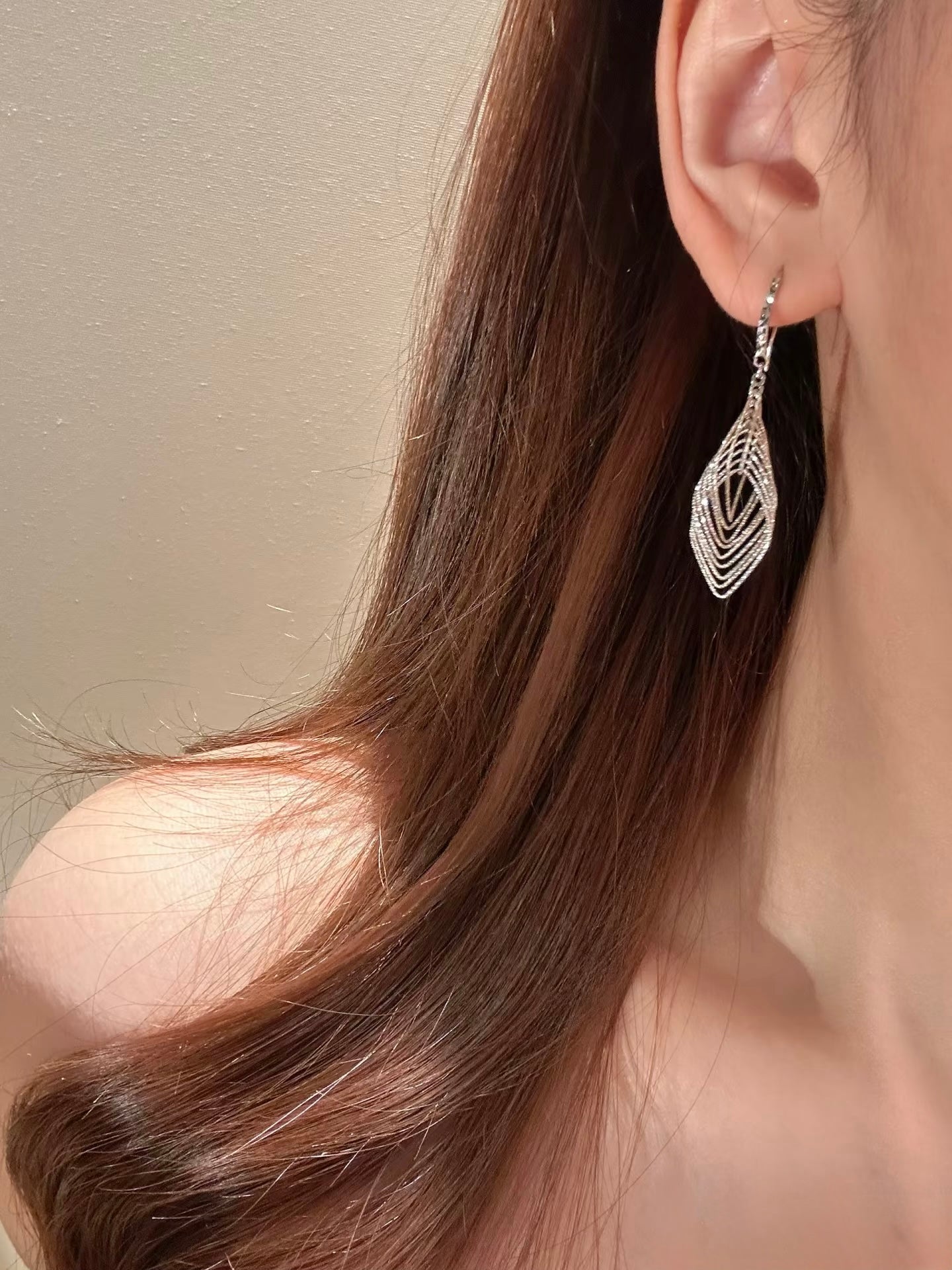 Luminous Veil earrings by Lunelle Atelier, rhodium-plated sterling silver earrings with a delicate, luminous design.