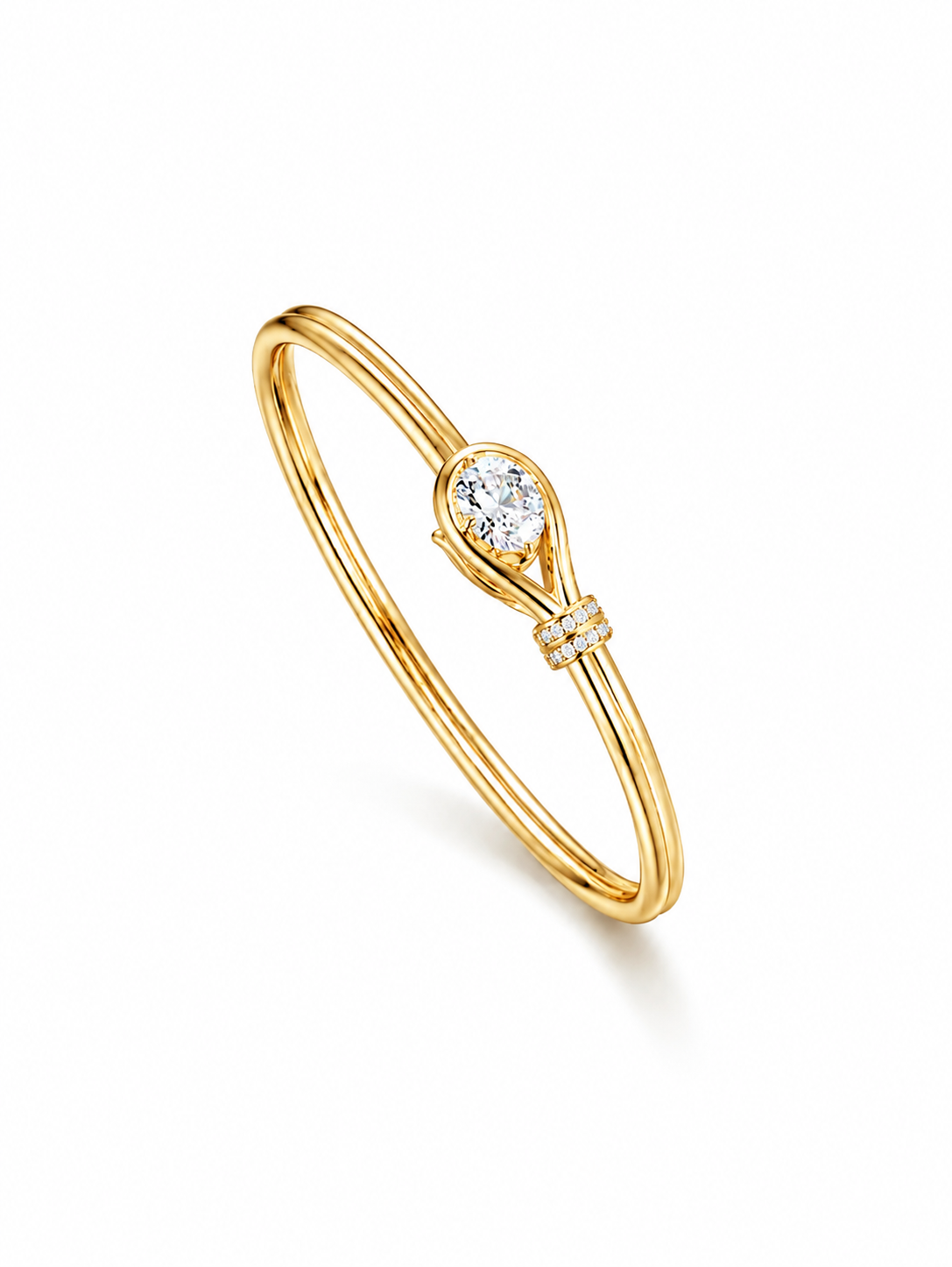 Lunelle Atelier teardrop solitaire open bangle bracelet with a sleek, minimalist design and a prominent teardrop-shaped gemstone.