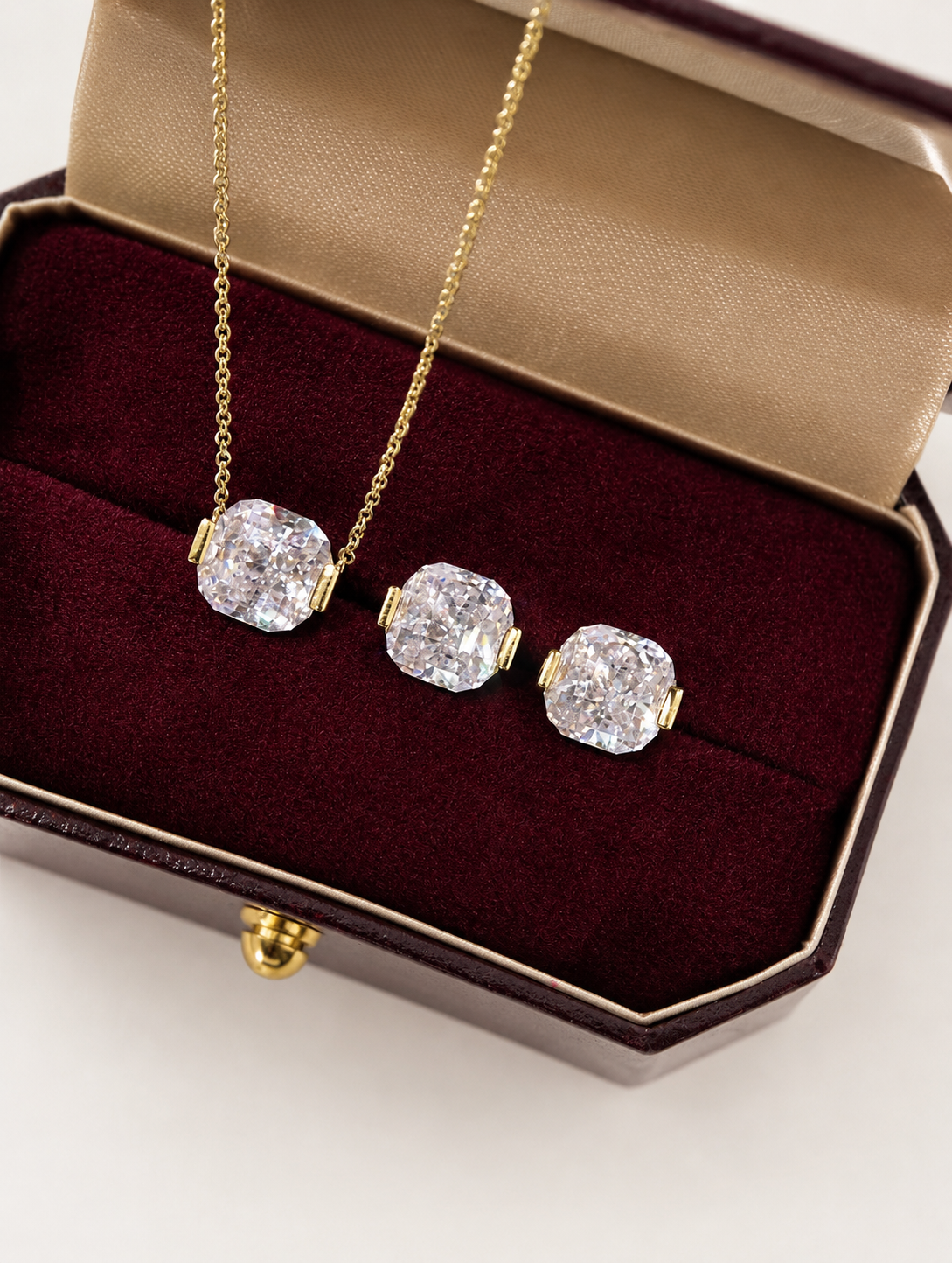 Crushed ice cushion cut necklace by Lunelle Atelier featuring a sparkling, elegant jewelry piece with a cushion-shaped pendant.