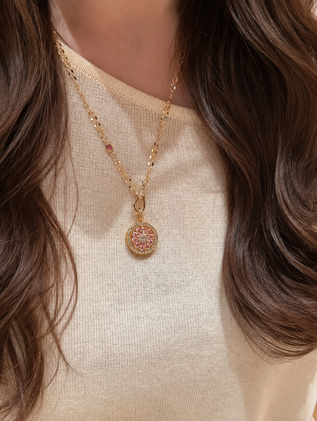 Lunelle Atelier spinning compass pendant necklace with enhancer clasp, showcasing a detailed nautical-inspired design on a silver chain.