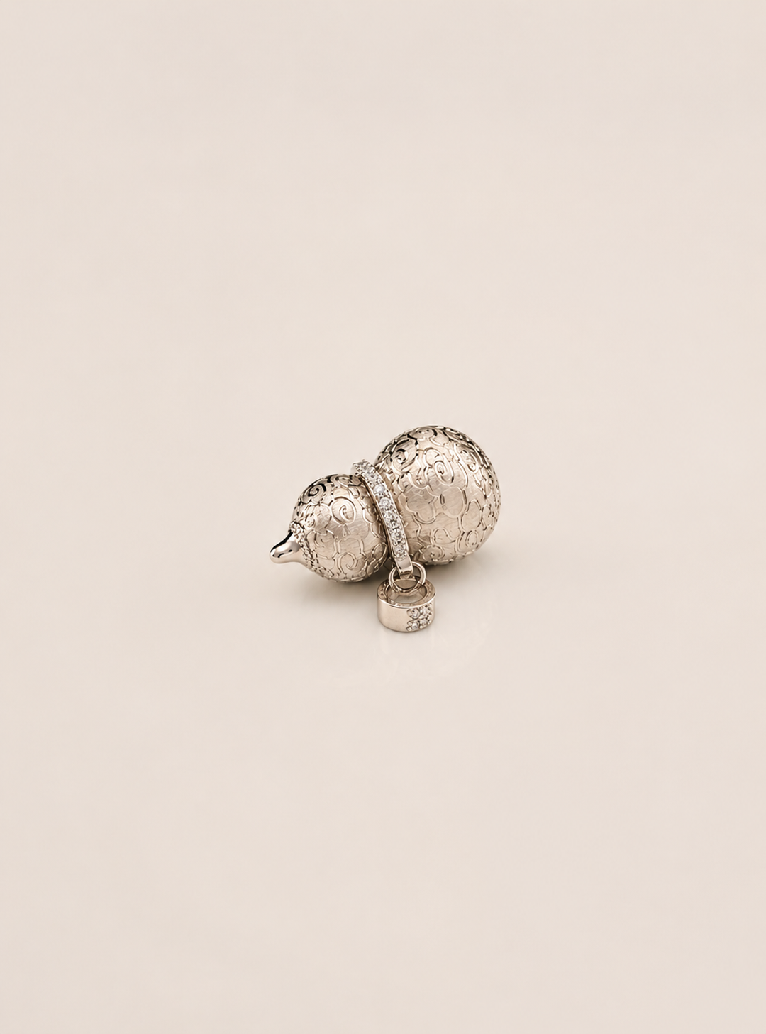 Lunelle Atelier petite auspicious gourd pendant necklace featuring a delicate, carved gourd charm on a fine chain.