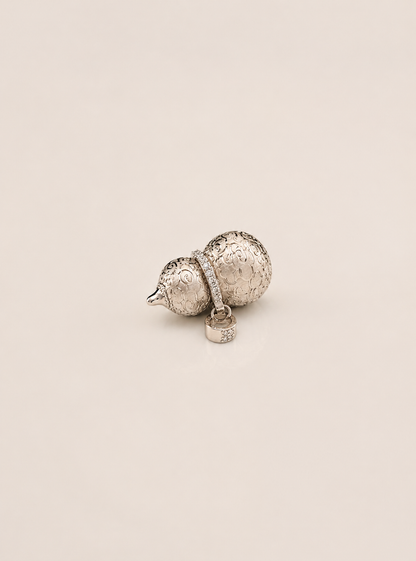 Lunelle Atelier petite auspicious gourd pendant necklace featuring a delicate, carved gourd charm on a fine chain.