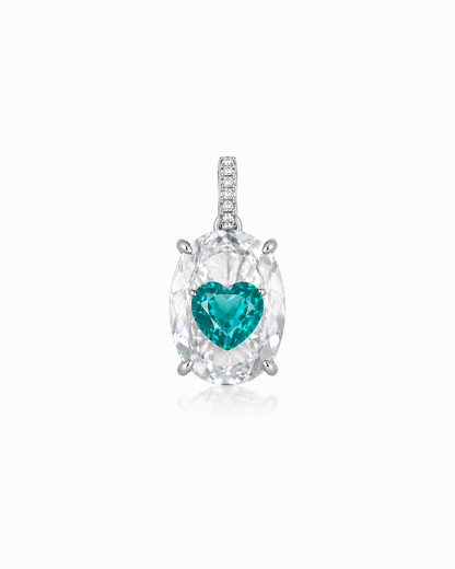 Pendant with a heart-shaped green gemstone on a white background