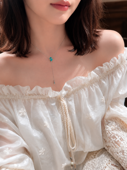 Lunelle Atelier Dew Drop Lariat Necklace with delicate chain and teardrop pendant, elegant jewelry accessory.
