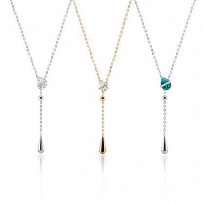 Lunelle Atelier Dew Drop Lariat Necklace featuring a delicate chain and teardrop pendant, elegant jewelry accessory.