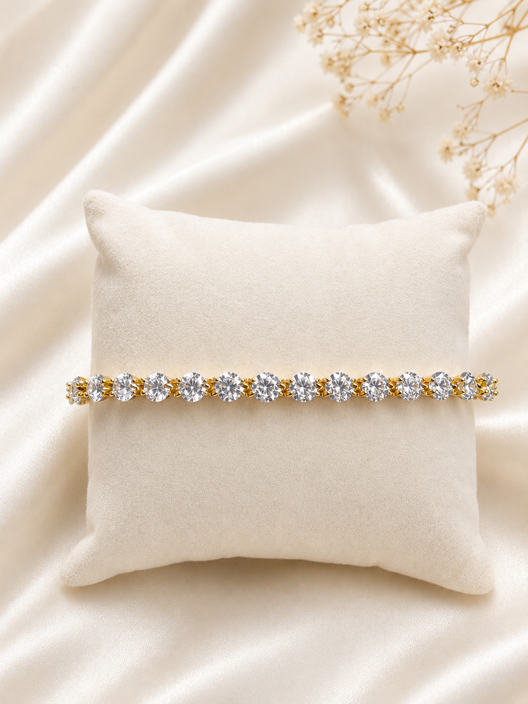 Lunelle Atelier floating round-cut tennis bracelet with sparkling gemstones on a delicate silver chain.