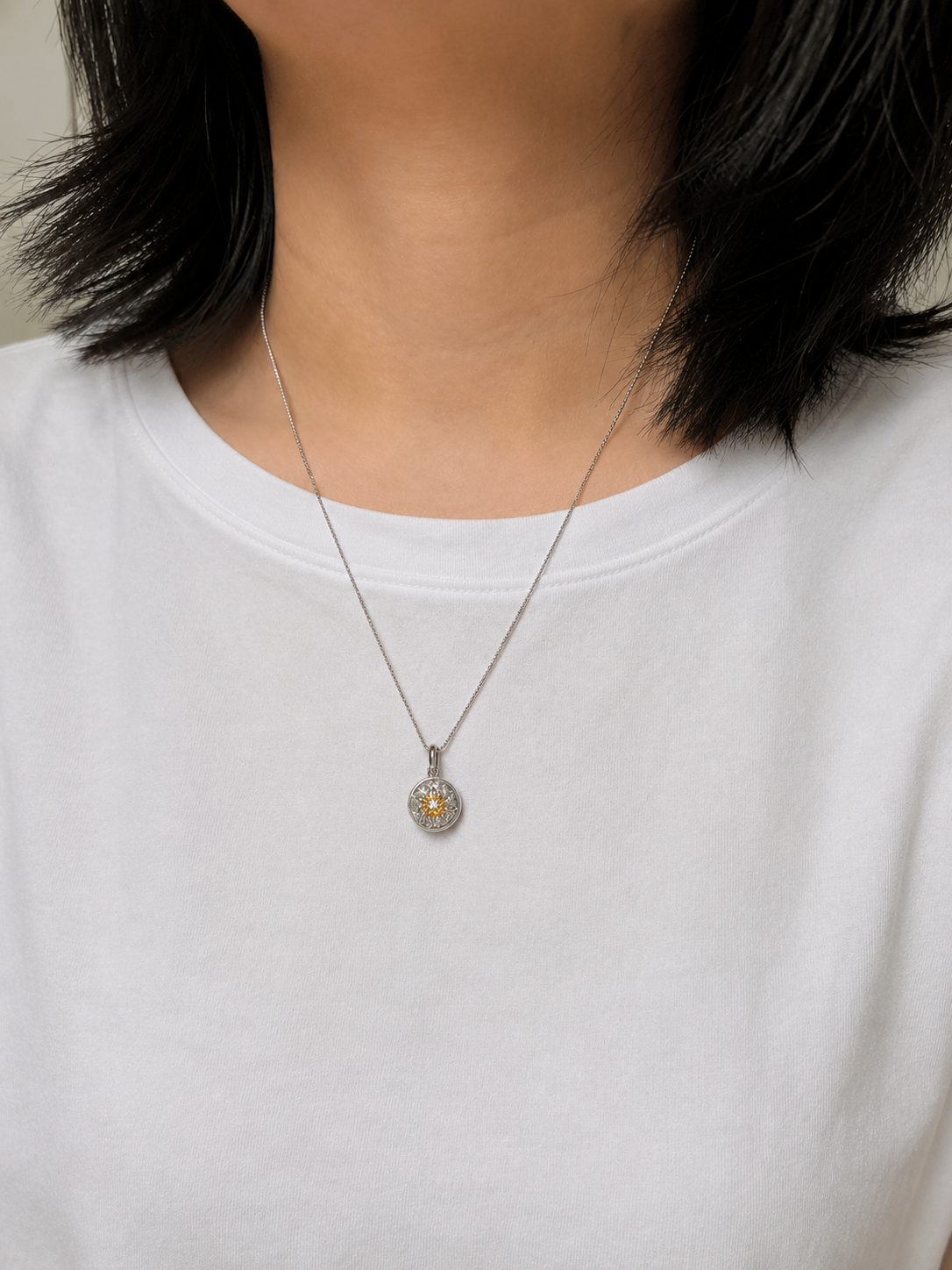 Lunelle Atelier Little Solé reversible necklace with silver finish, showcasing its elegant, versatile design on a white background.