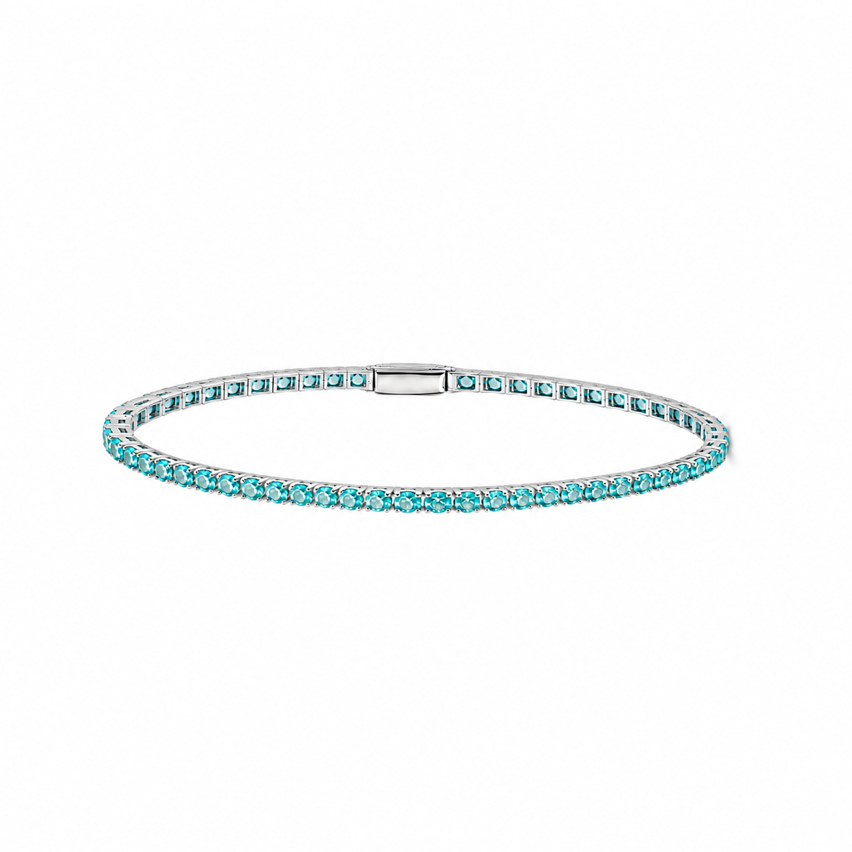 Petite Lab-Grown Paraiba tennis bracelet by Lunelle Atelier featuring vibrant blue-green gemstones and a delicate silver chain.
