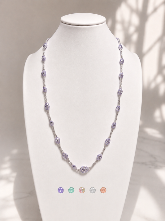 Lunelle Atelier Veil of Light woven necklace featuring delicate, intricate design with shimmering light-reflecting details.