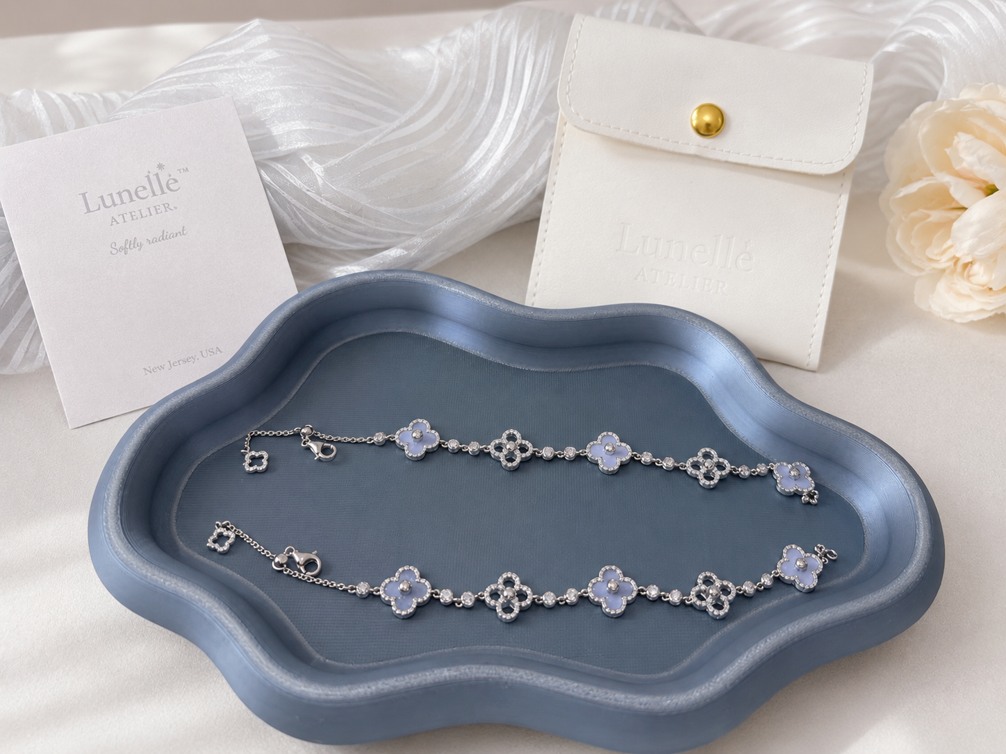 Lavender petal chalcedony bracelet by Lunelle Atelier with polished gemstone beads and silver clasp on a white background.