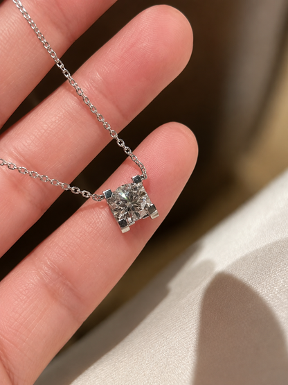 Lunelle Atelier sculpted solitaire lab-grown diamond necklace featuring a sparkling round-cut diamond pendant on a delicate chain.