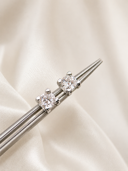 Lunelle Atelier sculpted solitaire lab-grown diamond stud earrings with a sleek, elegant design and sparkling gemstone settings.