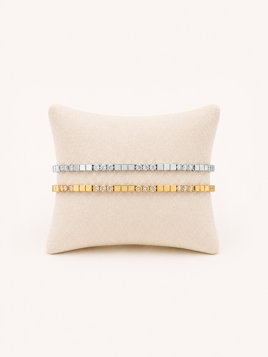 Lunelle Atelier modern bar tennis bracelet with sleek metal bars and elegant design, close-up view of the jewelry piece.