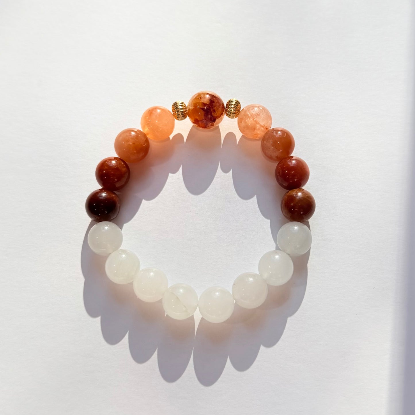 Multicolored beaded bracelet on a white background