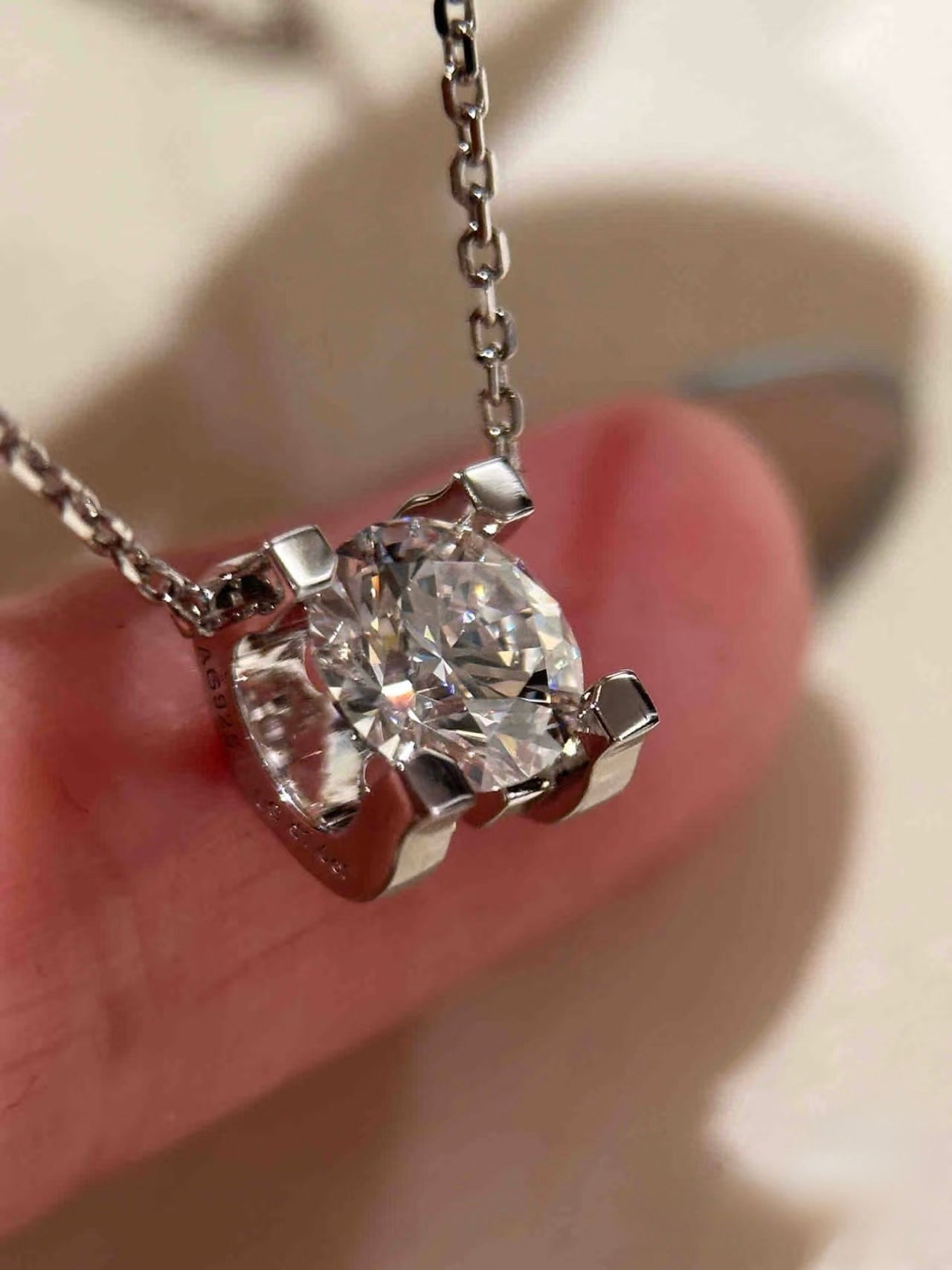 Lunelle Atelier Sculpted Solitaire Lab-Grown Diamond Necklace featuring a single sparkling diamond pendant on a delicate chain.
