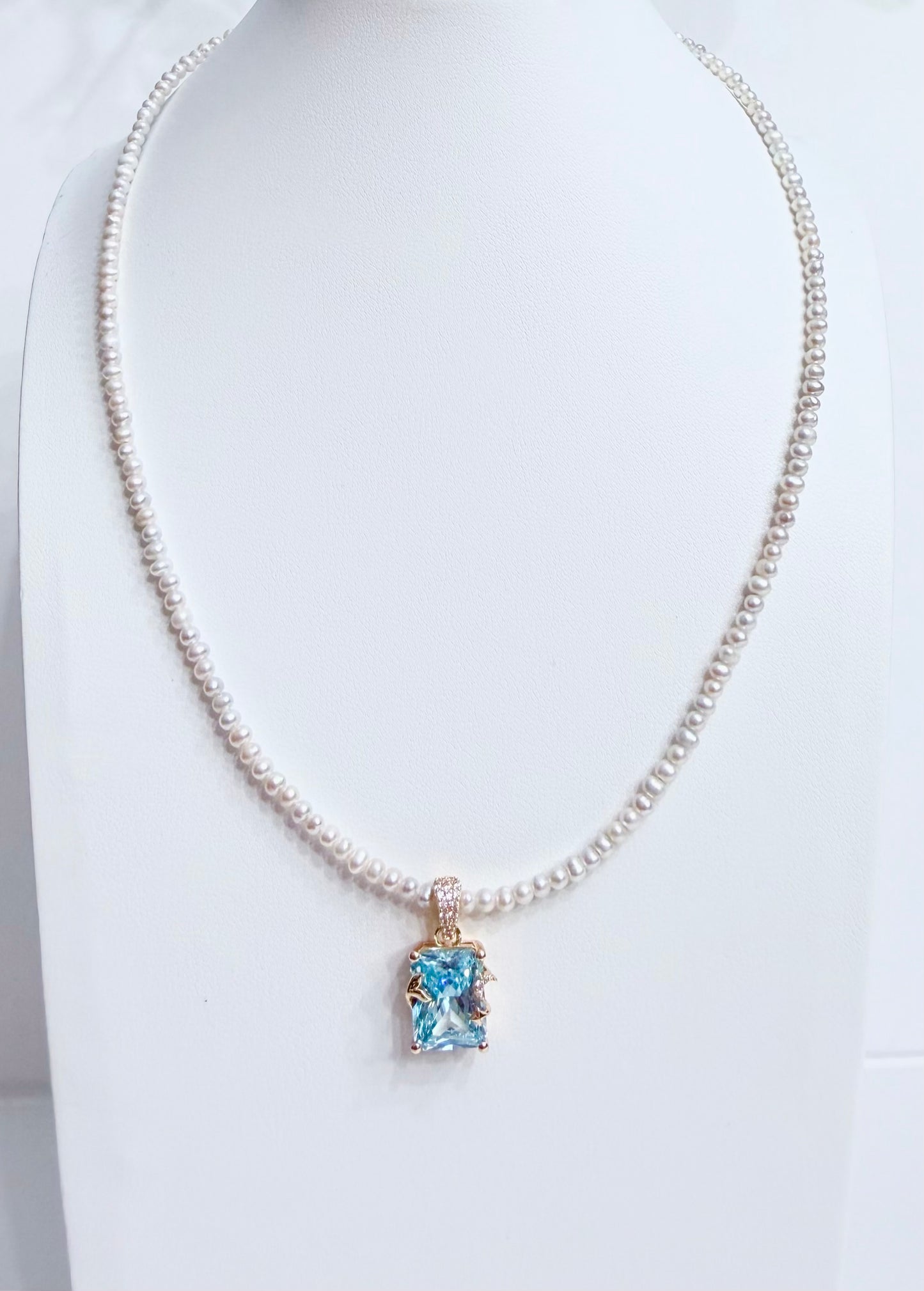 Lunelle by Heart and Hand mini freshwater pearl necklace with small, lustrous pearls on a delicate chain.