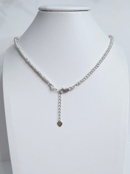 Lunelle by Heart and Hand mini freshwater pearl necklace with a delicate pearl strand and silver clasp.