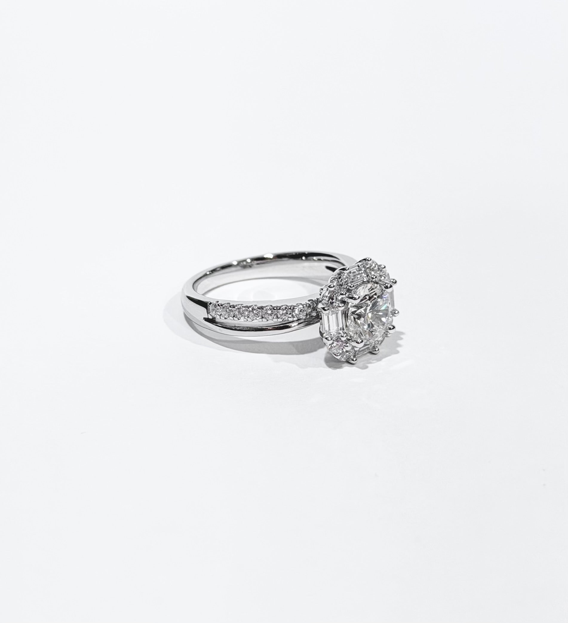 Diamond ring on a light gray background